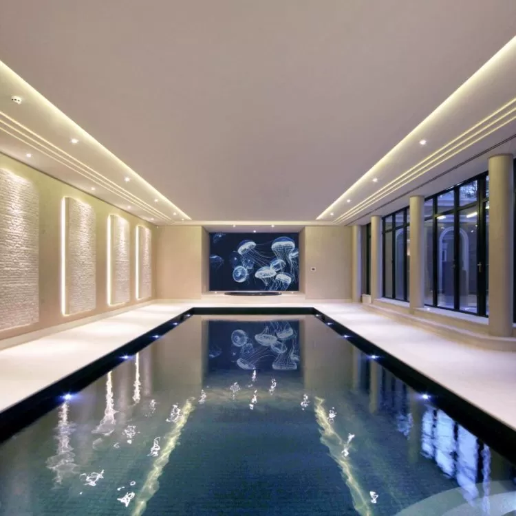 Luxury indoor exercise lap pool with underwater LED lighting