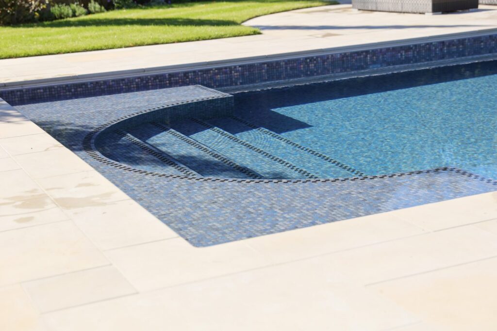 Lowered Roman End Step Bay With Tenerife Pool Finishing